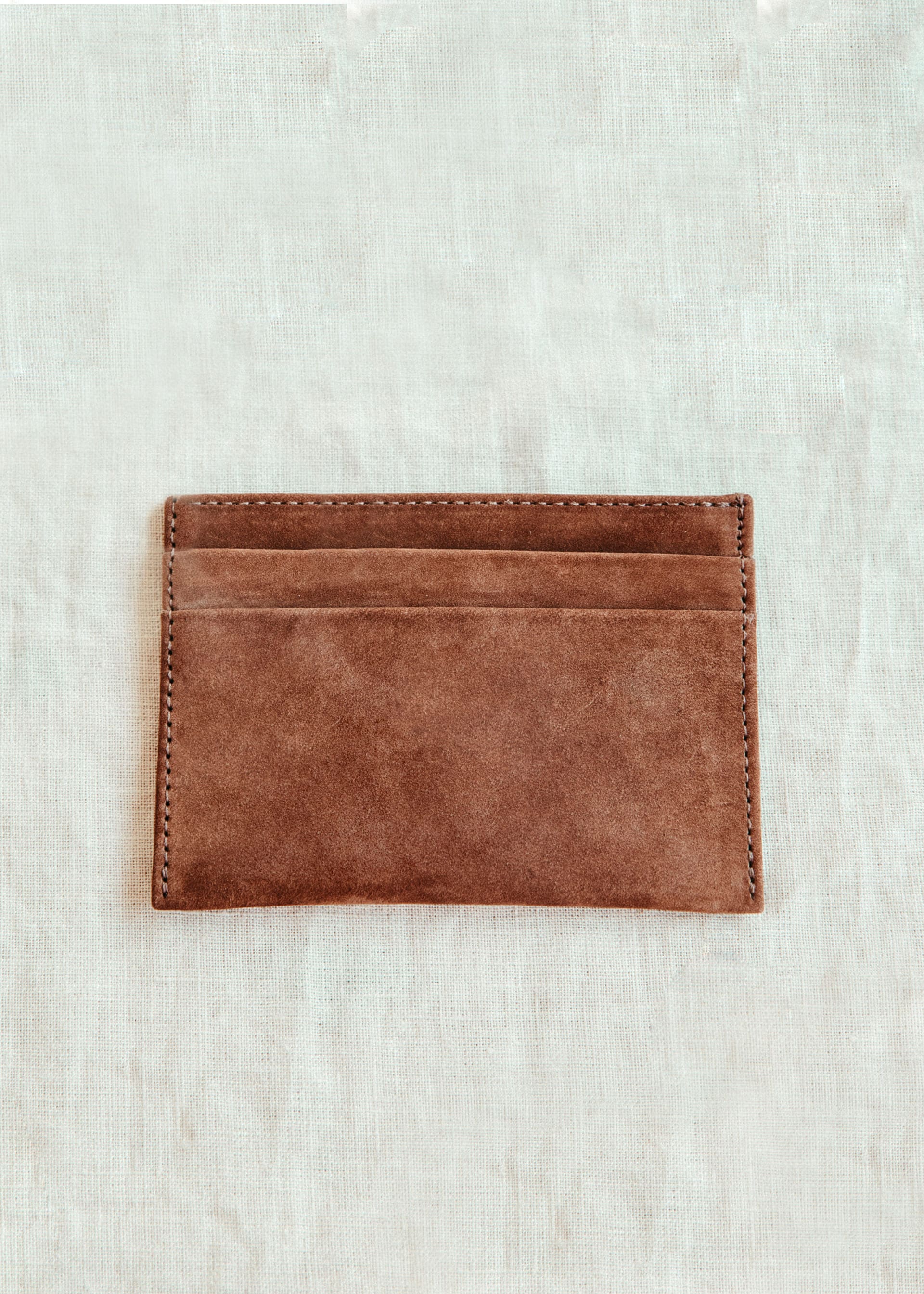 inside view of brown nubeck leather wallet